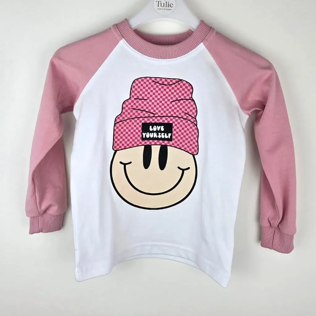 Biało-różowy longsleeve dziecięcy ze smiley – Love Yourself (86)
