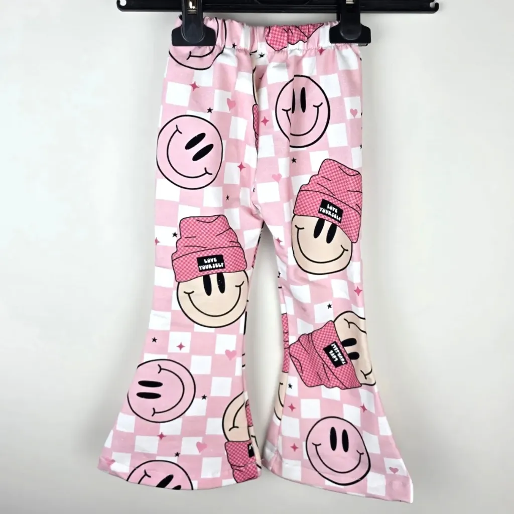 Różowe legginsy dziecięce dzwony Smiley all-over bawełna (86)